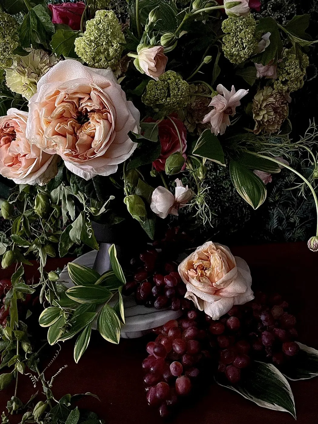 Roses and grapes in the Dutch still life manner